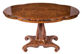 A Victorian burr walnut veneer and inlaid breakfast table:, of quatrefoil outline,