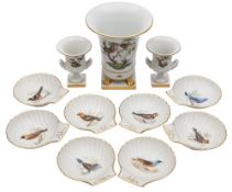 A group of Herend and French porcelain: comprising a Herend Empire-style vase with gilt claw feet
