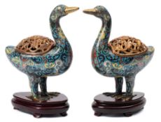 A pair of Chinese cloisonne enamel goose incense burners and gilt-copper covers: each bird