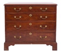 A George III mahogany rectangular chest:, the top with a moulded edge,