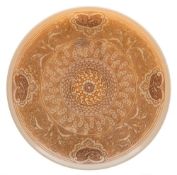 A Thomas Webb 'ivory' cameo glass plate: carved and brown patinated with bands of stylised flowers,