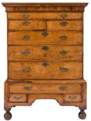 An early 18th Century walnut and feather banded chest on stand:,