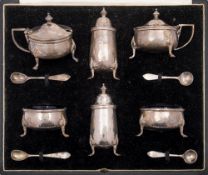 A George V hammered silver six-piece cruet set, maker Goldsmiths & Silversmiths Co Ltd, London,