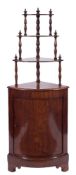 A 19th Century French mahogany bow-fronted standing corner cupboard:,