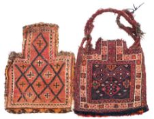 A Belouchistan saddle bag:, the indigo face with triple lozenge and cruciform medallions,