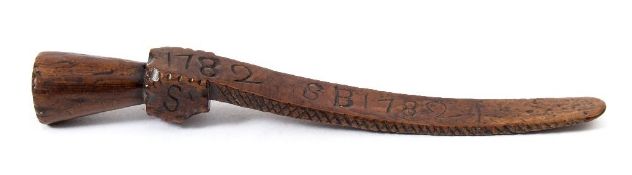 An 18th century fruitwood knitting sheath: with geometric decoration and initialled SB 1782, 18cm.