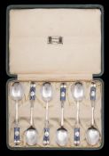 Liberty & Co, a set of six George V silver and enamel coffee spoons, Birmingham, 1928: 11.5cm.