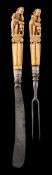 An early 18th century Dutch ivory handled travelling knife and fork set: each carved with a naked