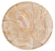 A large alabaster shallow offering dish: with gently sloping sides to an inverted rim 37cm diameter