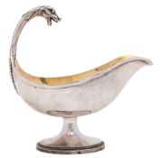 A 19th century French silver gilt sauce boat.