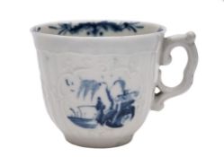 A First Period Worcester blue and white coffee cup: of moulded strap-fluted form with scroll handle,