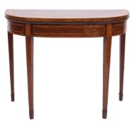An early 19th Century mahogany and inlaid card table:, of D shaped outline,