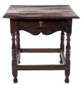 An oak rectangular side table:, with an overhanging top,
