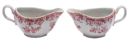 A pair of Chinese export 'camaieu rose' sauce boats: painted with floral sprays and foliage,