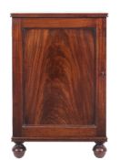 An early 19th century mahogany dwarf cabinet:,