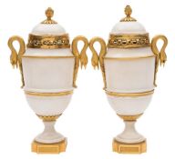 A pair of 19th century French ormolu mounted and white marble cassolettes: of classical urn-shaped