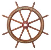 A teak ship's wheel:,