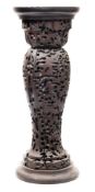A turned wood jardiniere stand with shipworm (Teredo navalis) damage:, of baluster form, 78cm high,