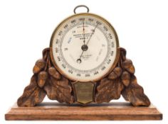 A circular brass Mark II aneroid barometer by Short & Mason,London:, signed to dial as per title,