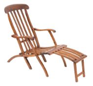 An early 20th century beech folding steamer chair with retailer's label Griffiths McAlister & Co,