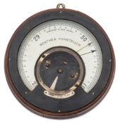 A circular oak cased 'Weather Foreteller' by Negretti & Zambra, London, circa 1920:,