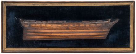 A 19th century wooden half-block model of a frigate:, with carved bow and stern galley,