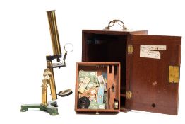 A late 19th century brass student microscope:,