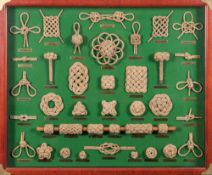 Ray Tucknott. A framed knotwork display board:, on a green ground with gilt brass name plates, 46.
