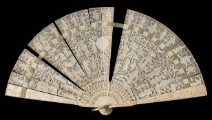 A 19th century Cantonese carved ivory brise fan: carved to one side with figures in a garden