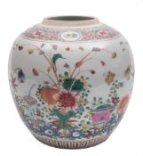 A Chinese famille rose ginger jar: painted with a jardiniere and a vase amongst floral sprays and