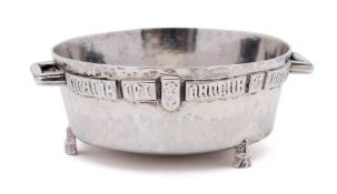 An Arts and Crafts beaten silver salt, maker F J Ross & Sons, London,