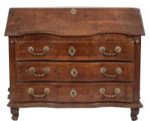 An 18th Century Lombardy walnut serpentine block fronted bureau:,