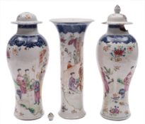 A garniture of three Chinese porcelain vases: comprising a trumpet vase and two baluster vases and