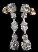 A pair of diamond pendant drop earrings: each with a lower brilliant-cut diamond drop of 1.