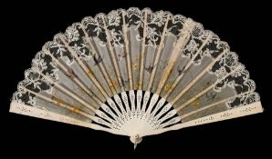 A late Victorian ivory and lace fan: the painted gauze leaf decorated with finches and song birds