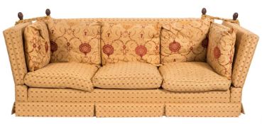 A matching three seat settee:, with six loose cushions, 237cm (7ft 9in) long, 92cm (3ft) depth,