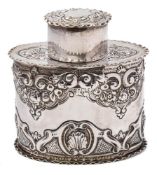 A Victorian silver tea caddy and lid, maker Josiah Williams & Co, London, 1893: of oval outline,