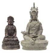 An Eastern cast iron and gilt splash decorated Buddha: seated cross legged with hands held in