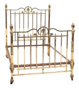 A Victorian brass double bed,