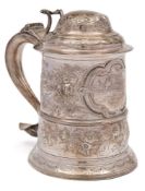 An early George III silver tankard, maker's mark worn probably John Langlands,