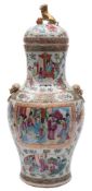 A Canton famille rose vase and cover: the ovoid body and waisted neck with gilt lion mask ring