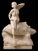 An Art Deco period alabaster lamp/sculpture: of a female nude holding a string of beads and seated