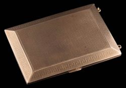 A 9ct gold cigarette case: approximately 84gms gross weight, marks are rubbed.