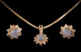 A star sapphire and diamond mounted 'star-burst' pendant on box-link chain and a pair of similar
