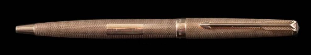 A 9ct gold ball point Parker pen, London assay marks, approximately 12.
