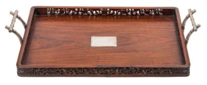 A Chinese carved hardwood tray with silver handles by Lainchang: of rectangular form with carved