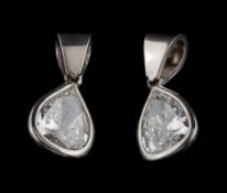 A pair of platinum and diamond pear-shaped drop pendants: each with a pear-shaped diamond