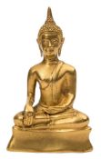 A gilt bronze figure of buddha shakyamuni: seated cross-legged,