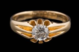 An 18ct gold and diamond claw-set,