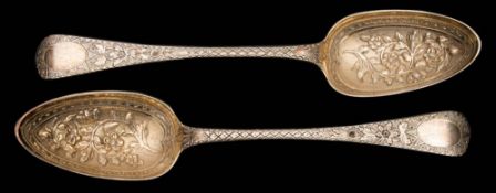 A matched pair of Victorian Old English pattern silver berry spoons maker's marks worn London,